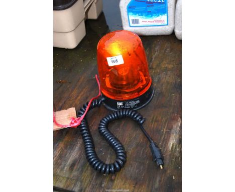 A magnetic tractor Beacon with cigarette lighter coupling.