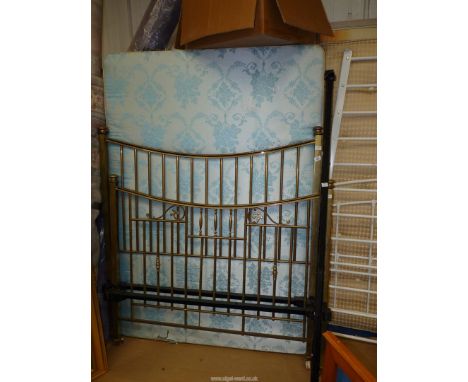 A brass double bedstead with base.