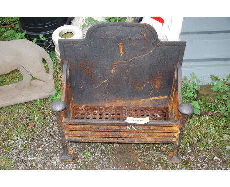 A cast iron dog basket/fire grate with cast iron back (as found).