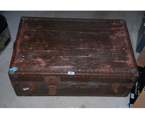 A metal bound trunk.