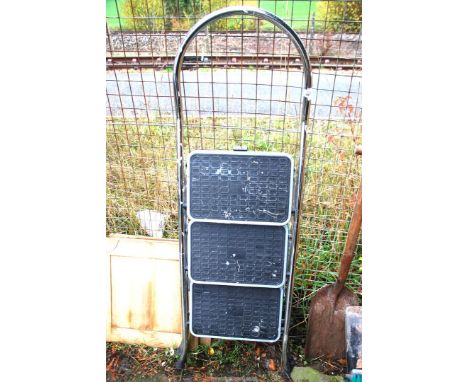 A three rung step ladder.