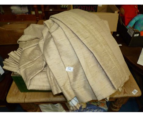 A quantity of beige pencil pleat curtains, various sizes.