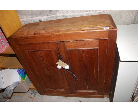 A pine Cupboard with a single shelf, 37" wide x 12 1/2" depth x 37 1/2" high.
