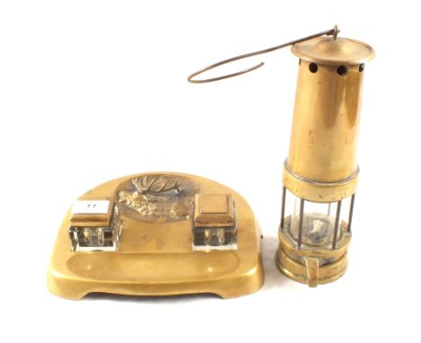 A Brass two bottle stag decorated inkstand, Geschutz mark to base plus a Brass miners lamp
