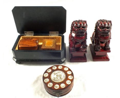 An ebony box, two others (one inlaid), a Chinese compass and a pair of composition Dogs of Fo