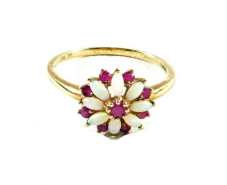 A 9ct Gold Opal and Ruby set ring of flower form, size P 1/2