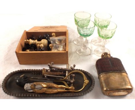 A hip flask, green wine glasses and other items