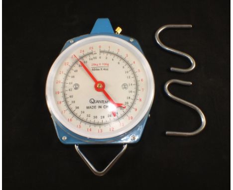 An unused large dial 55 pound scale