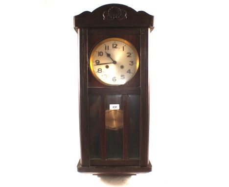 An Oak striking wall clock