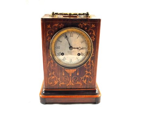 A 19th Century French striking bracket clock in Rosewood floral inlaid case by Le Roy, height 8"