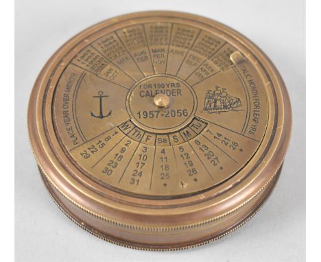 A Reproduction Cylindrical Compass with Lid Engraved with a 100 Year Calendar, 1957-2056, 7.5cms Diameter 