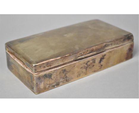 A Silver Cigarette Box with Engine Turned Decoration, 17x9cm, Varying Condition Issues to Include Dents etc 