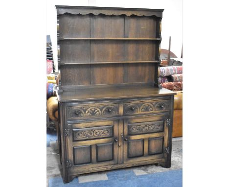 A Mid 20th Century Oak Dresser, the Base with Two Drawers Over Cupboard, Two Shelf Plate Rack, 123cm wide 