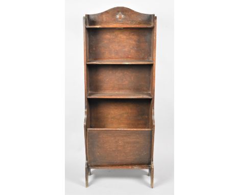 An Edwardian Oak Three Shelf Open Bookcase with Magazine Store to Base, 45cm wide and 119cm high 