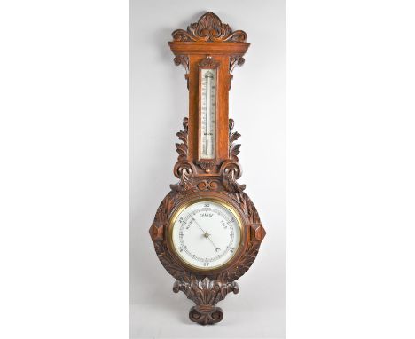 A Late Victorian Oak Framed Wheel Barometer with Thermometer, Carved Decoration, 93cm high 