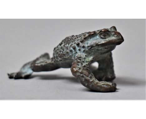 A Small Bronze Study of a Toad, 5cm long 