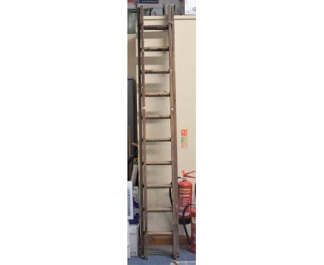 A Vintage Wooden Extending Ladder with Twisted Wire Step Guards 