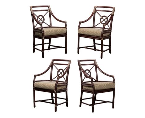 McGuire Bullseye Rattan Chair Collection  (4) armchairs having green upholstered cushions and metal tags to the undersides; t