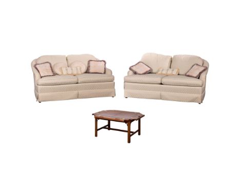 Baker Sofas and Coffee Table  (2) items including a pair of white upholstered sofas and a coffee table with extendable top, a