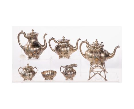 Sterling Silver Tea Service  (6) items having a lobed motif, including a coffee pot, teapot, water kettle having heating stan