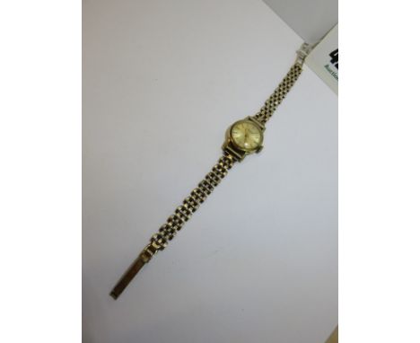 LADIES VINTAGE 18CT GOLD BREITLING WRIST WATCH on 9ct gold bracelet, appears in working condition 