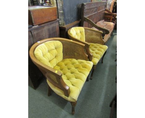 TUB ARM CHAIRS, pair of 19th Century cane panelled tub arm chairs on slender cabriole legs and gold button back upholstery
