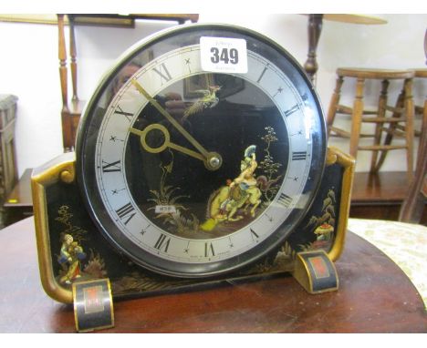 CHINOISERIE MANTLE CLOCK, a retro electric mantle clock decorated with raised laqueered designs