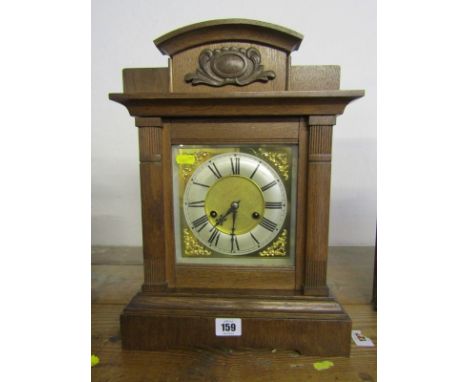 EDWARDIAN BRACKET CLOCK, oak architectural cased bracket clock by Ansonia with coil bar strike, 15" high 