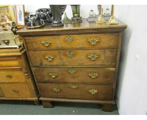 GEORGIAN OAK CHEST OF DRAWERS, straight front chest of 4 long graduated drawers, brass swan neck handles & shaped escutcheon'