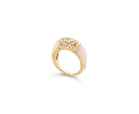  Van Cleef & Arpels: A diamond and white coral 'Philippine' ring  The central brilliant-cut diamond panel, within a ropetwist