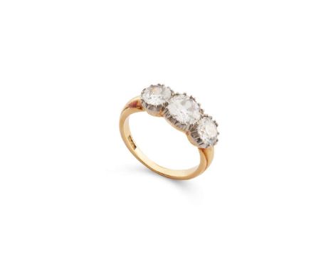  A three-stone diamond ring  The old brilliant-cut diamonds, the largest to the centre, in pinched collet-settings, principal