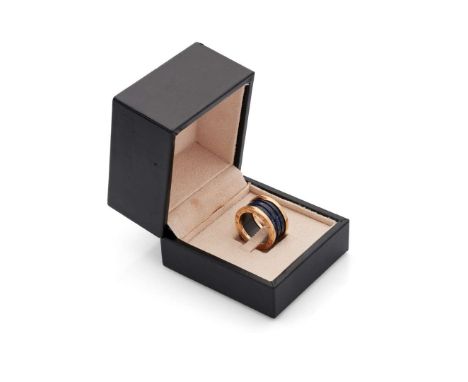  Bulgari: A lapis lazuli B.zero1 ring  The carved ringed lapis lazuli centre, within a frame engraved BVLGARI, numbered, ring