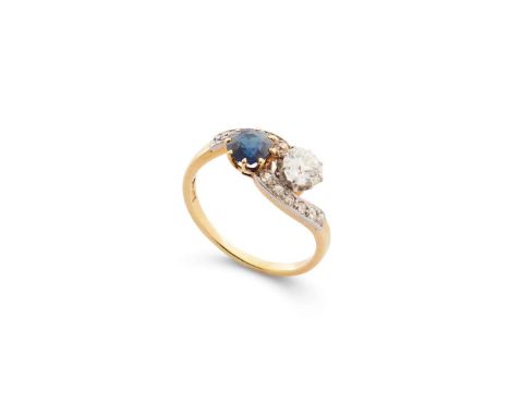  A sapphire and diamond toi et moi ring  The circular-cut sapphire and old brilliant-cut diamond in a crossover setting, betw