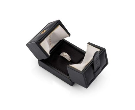  Bulgari: A diamond ring  The collet-set heart-shaped diamond, weighing 0.54 carat, to a wide band pavè-set with brilliant-cu