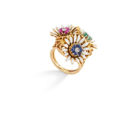  A floral enamel, ruby, emerald and sapphire ring, mid 20th century  Set with a trio of white enamel daisies, each centrally 