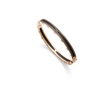  Bulgari: A B.zero.1 ceramic bangle  Of hinged design, centrally formed of matte black ceramic, the polished frame engraved B