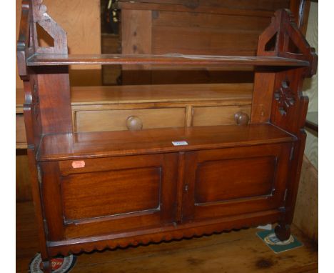 An Edwardian walnut double door wall cupboard having single upper shelf, width 61.5cm