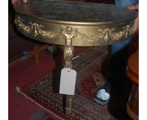 A pair of floral gilt decorated demi lune console tables