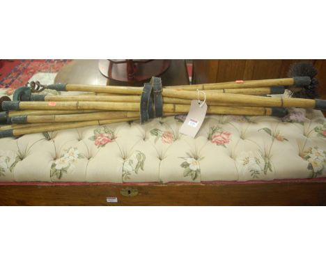 A collection of chimney sweep and drainage rods