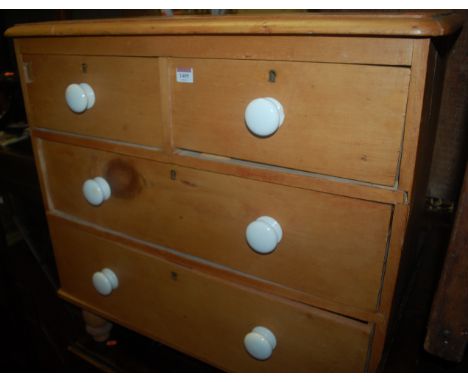 A Victorian pine chest of two short over two long drawers  Condition Report / Extra Information Splintered loss to top left h