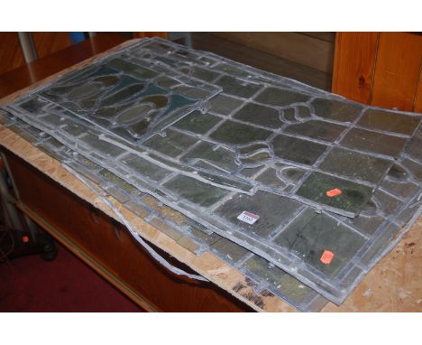 A collection of lead glass window panes and a further quantity of prints
