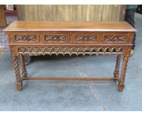 HEAVILY CARVED OAK FOUR DRAWER CONSOLE TABLE