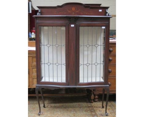 ANTIQUE MAHOGANY INLAID BOW FRONTED DISPLAY CABINET WITH TWO LEAD GLAZED DOORS 