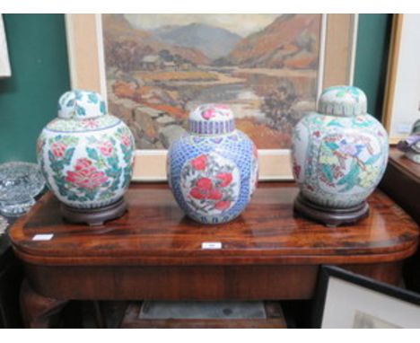 THREE VARIOUS HANDPAINTED CHINESE CERAMIC GINGER JARS WITH COVERS 