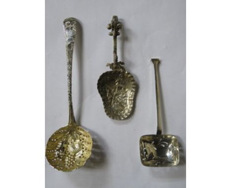 GEORGIAN SILVER SIFTING SPOON, ANOTHER SIFTER AND ORNATE SILVER AND SILVER CADDY TYPE SPOON 