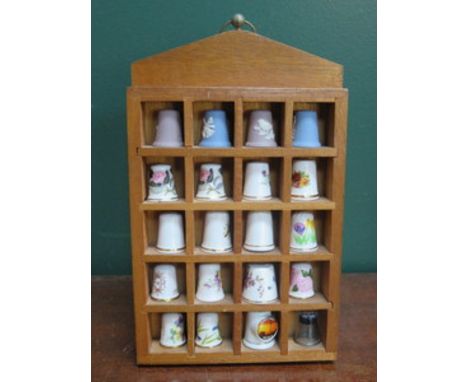 PARCEL OF TWENTY THIMBLES ON STAND INCLUDING WEDGWOOD, ROYAL WORCESTER, ETC. 