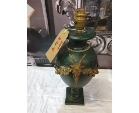 Green and brass urn lamp with goat head motif no shade damage noted (SR249)