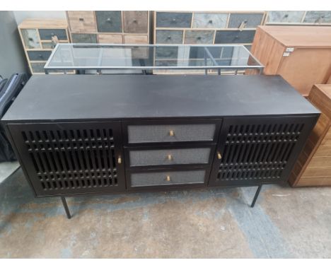 Baston Sideboard A Timeless And Sculptural Sideboard The Black Solid Wood Sideboard Features Doors Made Of Wooden Slats That 