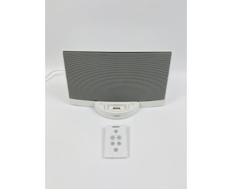 Bose speaker and ipod dock. Estimate: £20-30From the Estate of Del Palmer.