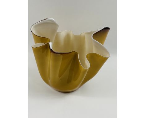 A large Murano glass handkerchief vase of typical style and form, signed to the underside, 27 x 27 x 26cms. Estimate £20-40.